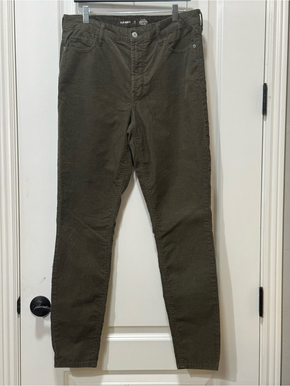 Old Navy woman’s Green corduroy Pants size 12. W 17”, R 13” InS 30